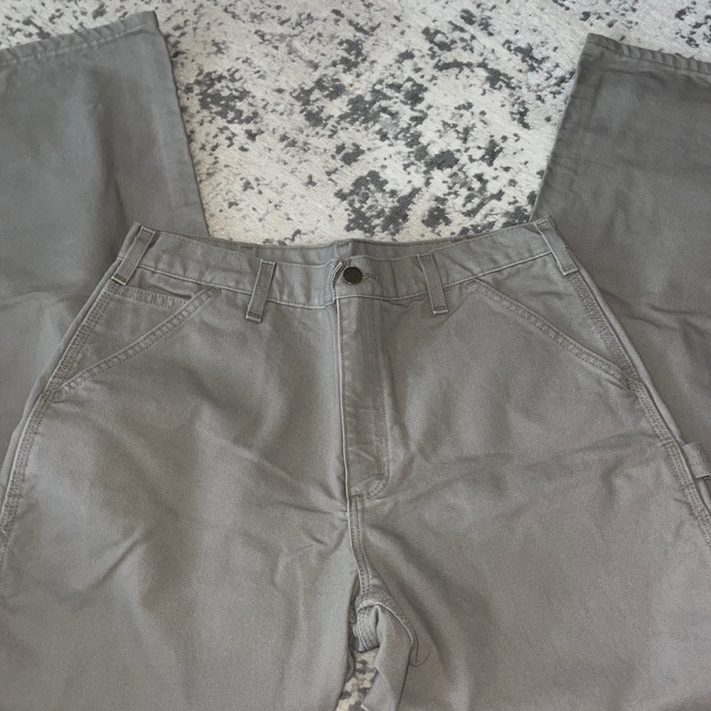 Beige size 34x32 carhartt dungarees.